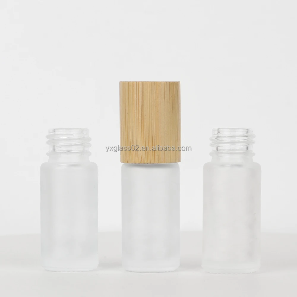 Roll On glass Bottle 5ml 10ml essential oil roller bottles skincare cosmetic packaging glass bottle with bamboo wooden cap supplier