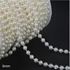 Un mètre de perles en fil de coton 6 mm (blanc cassé)