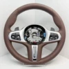 Brown leather; Black buttons