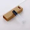 Clear glass spray bottle + black cap + brown box