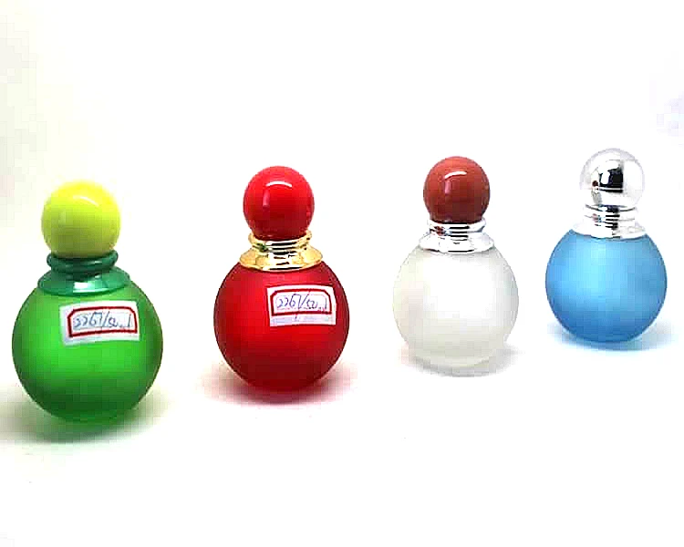 perfume in green round bottle