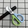 Tijeras para puros azul verdoso.