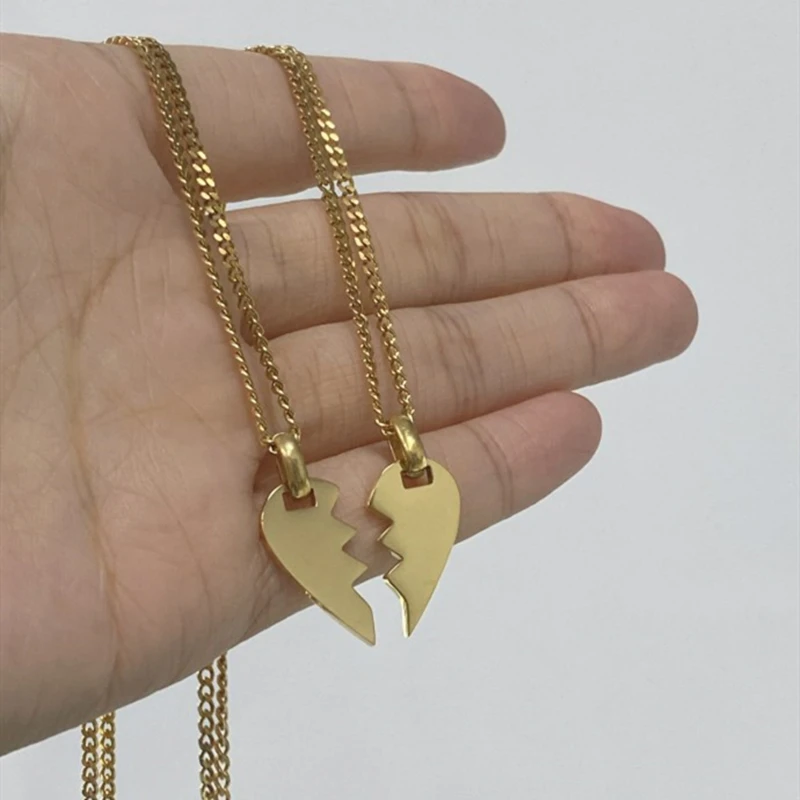 Collana acciaio cuore a strati bullonato cromato e oro per donna