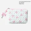 Neceser hexagonal pequeño blanco con lazo rosa de arroz.