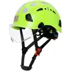 Casco de seguridad verde con visera transparente
