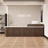 Coffee-colored wood grain with ivory countertop