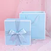 Lazo azul; 20,5*20,5*10 (caja de regalo + bolsa de regalo)