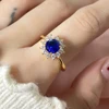 Piedra azul con baño de oro de 18k