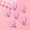 Heart-shaped hooks in pink
