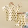 Completo beige con stampa orsetto