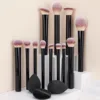 12 spugnette per trucco nere + blender + piumino da cipria