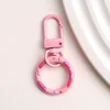 #12 - Pink Donut-shaped Spring Hook Door Lock