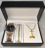 Reloj rosa negro + accesorios dorados + caja