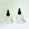 Transparent flat square bottle body + black rubber cap