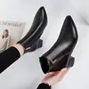 The leather surface is black.