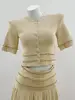 Top giallo chiaro