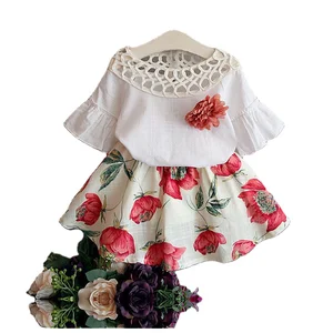 Shenzhen Kids Clothing with Hollow Out the Collar Flared Sleeve Blouse Floral Skirt Suit Cheap China Wholesale Kids