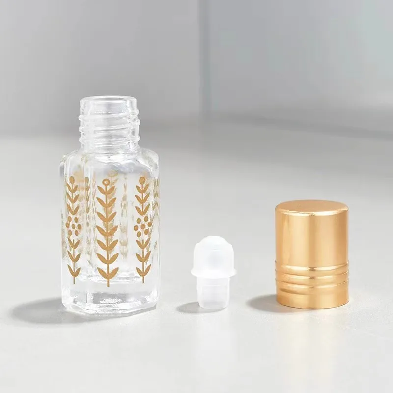 Top Grade 3ml 6ml 12ml Empty Golden Octagonal Essential Oil Roller Bottle Leaf-pattern Glass Roll on Perfume Bottle