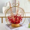 Hand basket of red berries