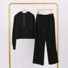 Black hooded half-pull sweat pants set