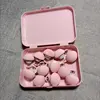 Caja de almacenamiento rosa de 12 unidades con clavos de tela y alfileres de acero.
