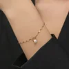 xkb2267-bracelet coquillage perle or