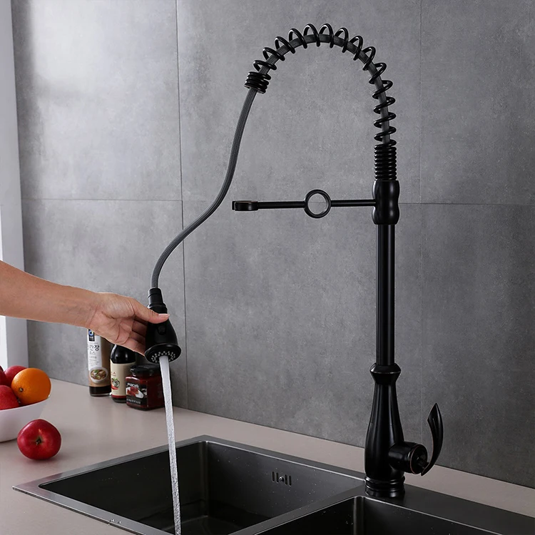 Grifo monomando para fregadero de cocina con resorte extraíble montado en cubierta dorada