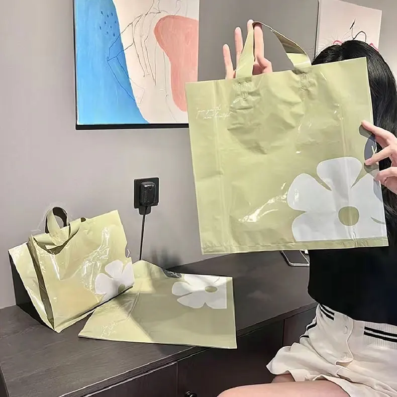 product custom thick hdpe plastic packaging bags with die cut handle convenient carrier shopping bag for supermarket  exhibition-10