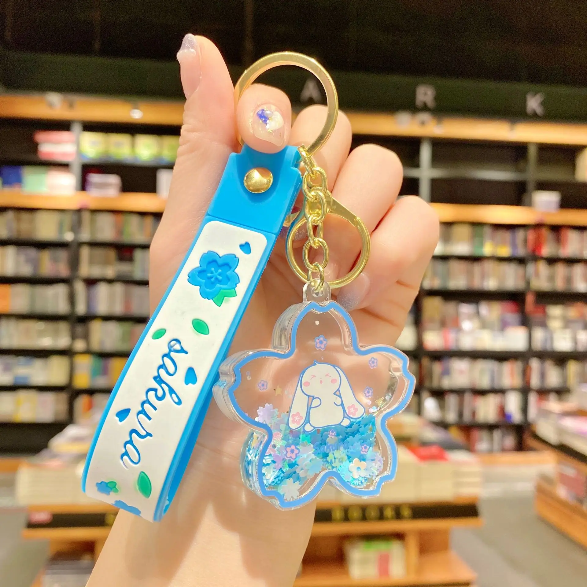 クリエイティブな浮遊桜ウサギキーホルダー、液体オイルウサギが動く