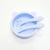 Ciotola in silicone azzurro cielo con orsetto, completa di cucchiaio in silicone.