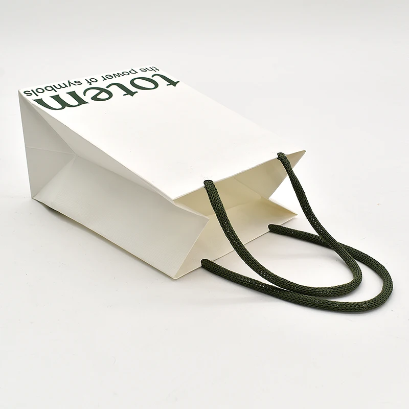 Customized Luxury Premium Gift Bag with Exquisite Embossing Sponge Lining UV Coating Matt Lamination manufacture