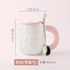 Pinkish-white spoon with lid