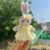 Abito farfalla perla gialla-dini appeso per la bambola
