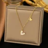 Collana in acciaio inossidabile con cuore a forma di conchiglia