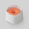 White and orange floating water bowl