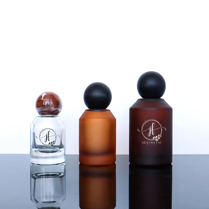 Luxury Unique Shape Frosted Amber Brown Spray Glass Bottle 30ml 50ml 100ml  Amber Perfume Bottle with Lids