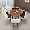Black and white leather desk with four chairs