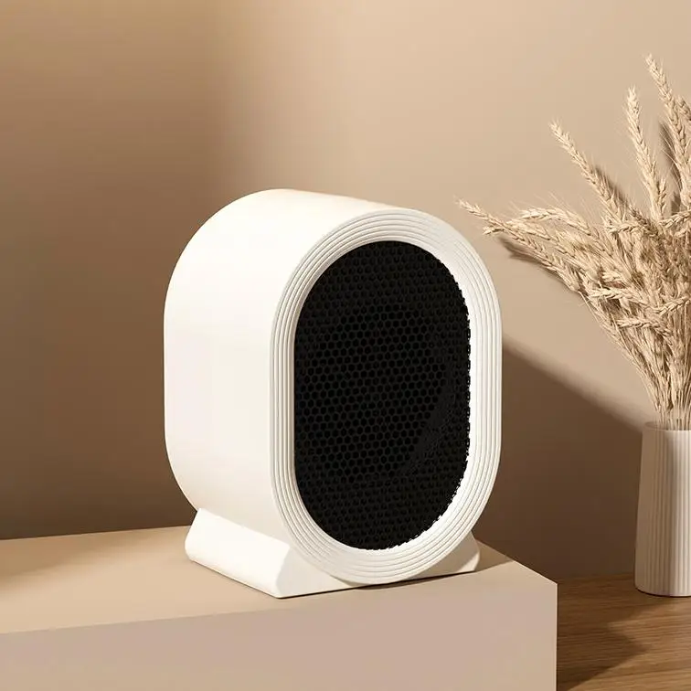 新しいミニデスクトップヒーター シンプルデザイン 家庭用インテリジェントヒーター オープンで暖かく静音運転のヒーター 2