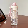 Poignée passoire à thé flottante rose 750 ml