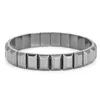 #Bloque rectangular negro de 11x8mm con doble agujero.