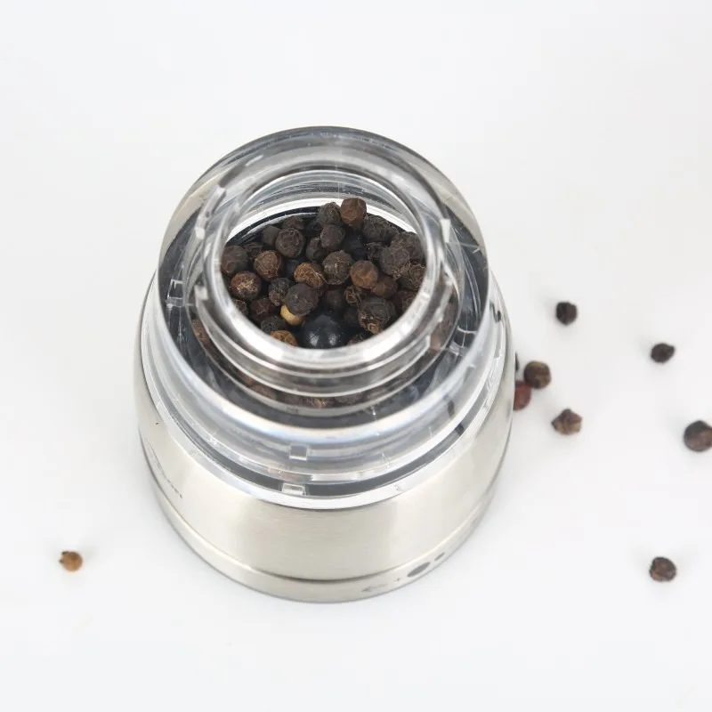 The Swifty Grinder for Salt and Pepper Grinding Stainless Steel Shell Acrylic Chamber