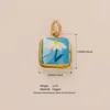 Ombrello oro con fiori blu.