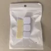 Three white ones [packaged in a pearlescent film bag]