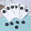 Bouton noir écru en coton mat