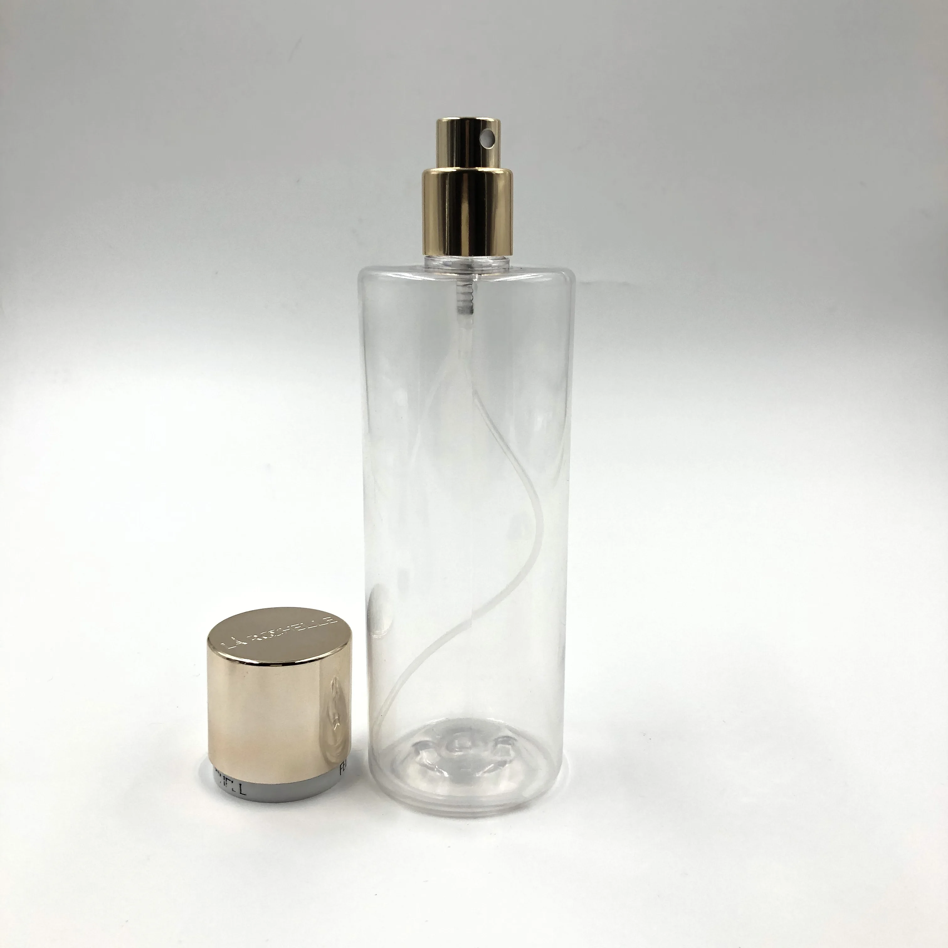 High End Custom  Plastic Perfume Bottles Gold 250ml Pet Transparent Aerosol Spray Perfume Bottle