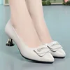 Piccolo bottone beige