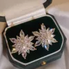 Orecchini a fiore con fiocco di neve - a679 oro