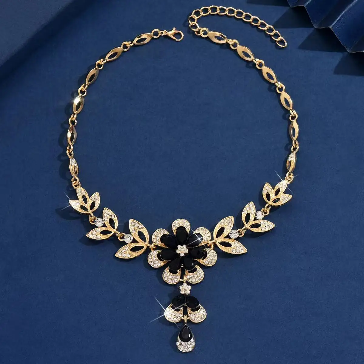 Elegant Gold Hollow Flower Necklace with Rhinestones