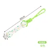 Green and white dumbbell-shaped rope