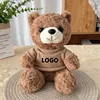 Maglione marrone con orsetto di peluche al curry